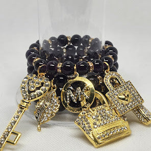 Four Piece Purple Bracelet Set