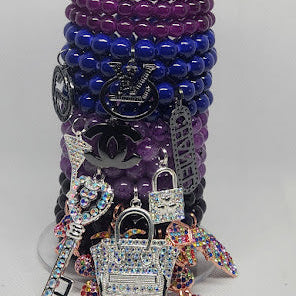 Four Piece Purple Bracelet Set